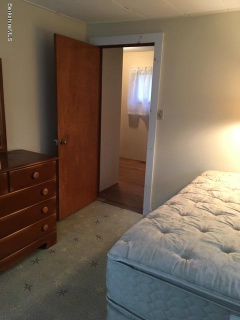 55 Cross Road Clarksburg, MA 01247 - Photo 18 of 22 a bedroom with a bed and a dresser