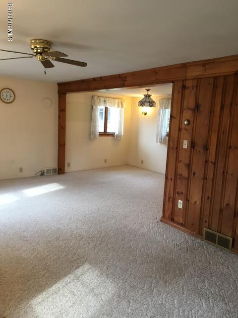 55 Cross Road Clarksburg, MA 01247 - Photo 3 of 22 a view of an empty room with a window