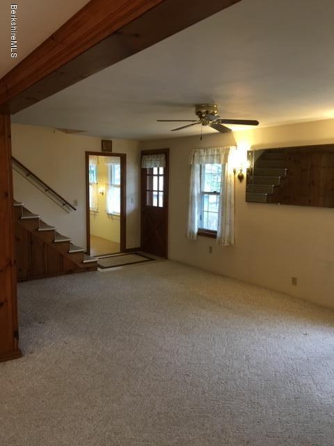 55 Cross Road Clarksburg, MA 01247 - Photo 4 of 22 a view of a living room with a fireplace
