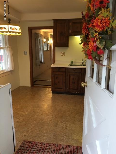 55 Cross Road Clarksburg, MA 01247 - Photo 10 of 22 a view of kitchen with granite countertop cabinets and potted plant