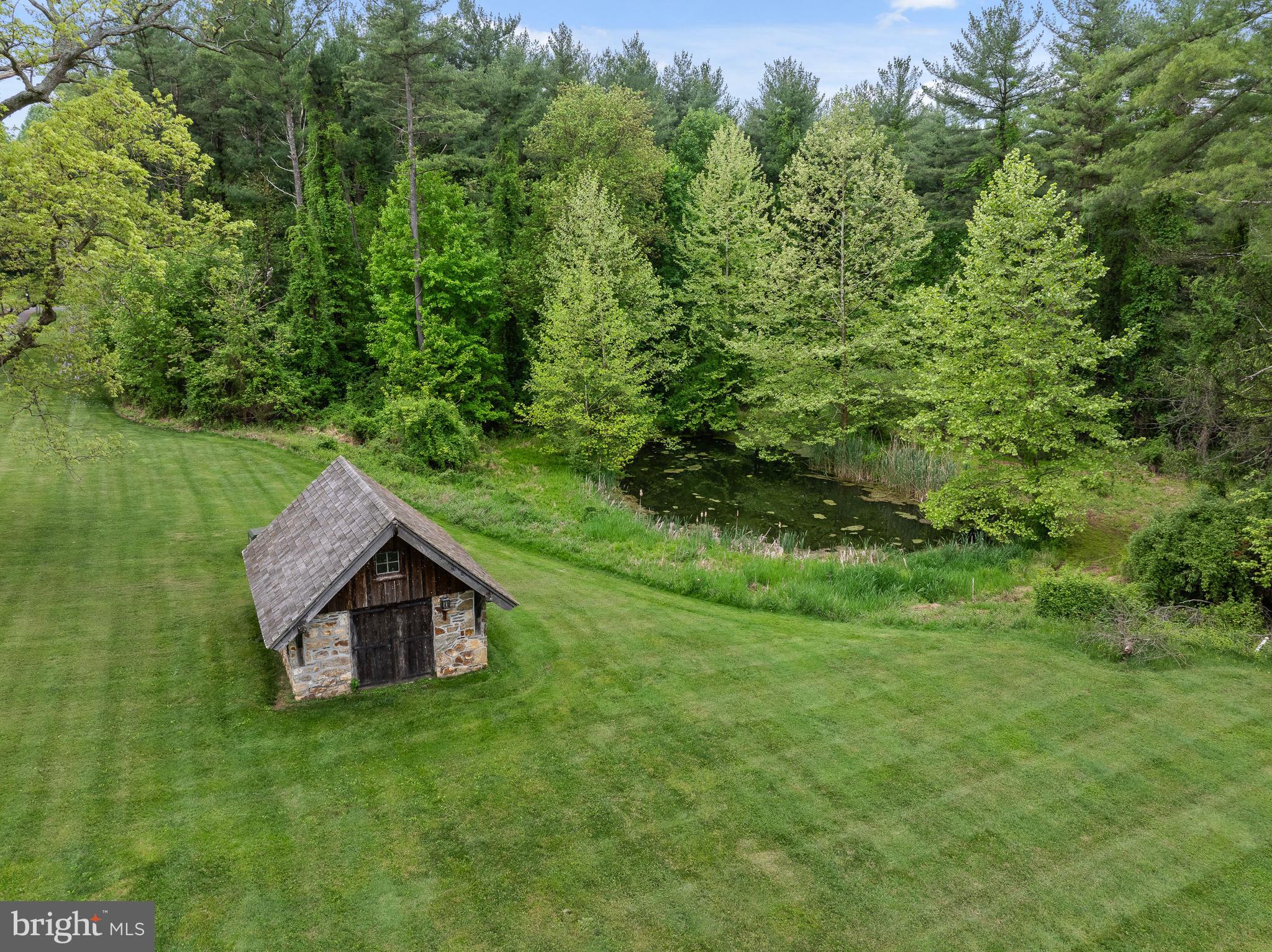 150 Springdell Road Coatesville, PA 19320 - Photo 6 of 53 Charming springhouse and pond