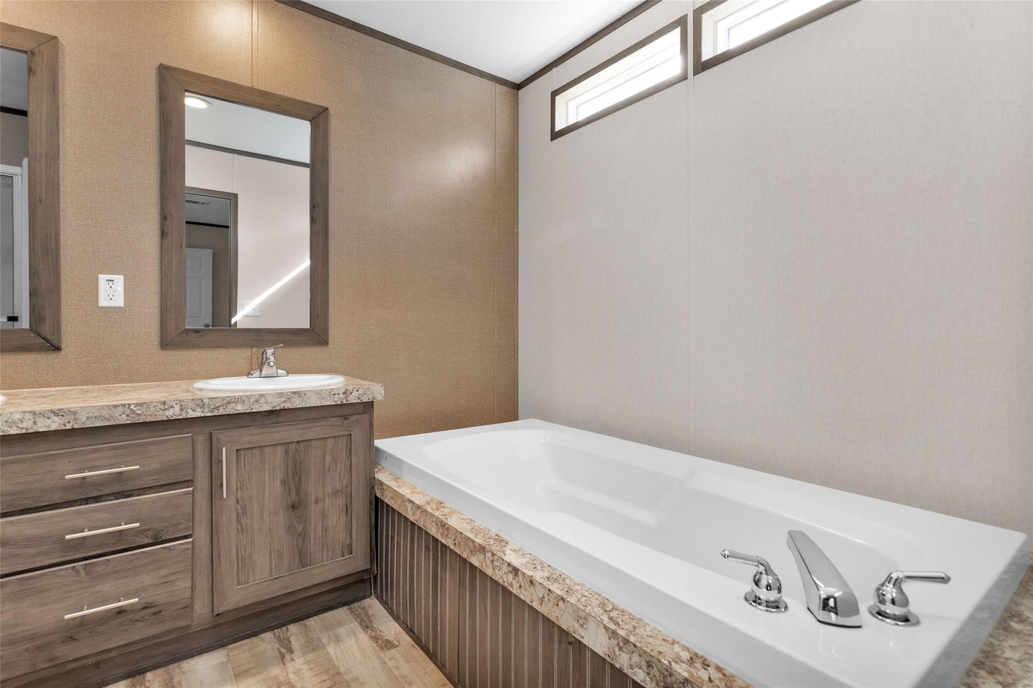 10161 Pollard Road, Unit 1 Willis, TX 77318 - Photo 13 of 22 a bathroom with a sink and a mirror