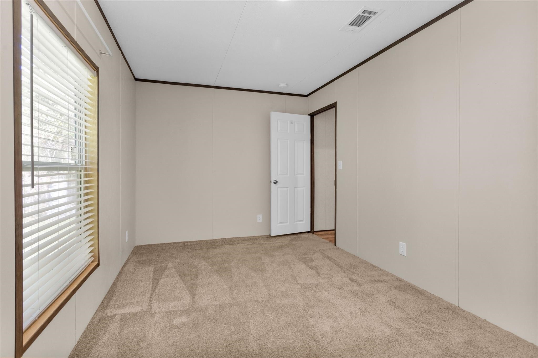 10161 Pollard Road, Unit 1 Willis, TX 77318 - Photo 18 of 22 a view of an empty room