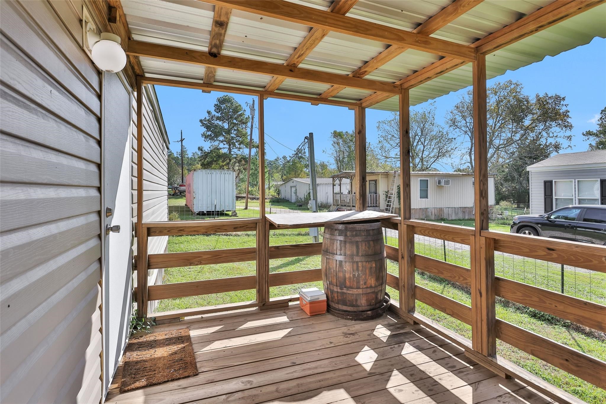 10161 Pollard Road, Unit 1 Willis, TX 77318 - Photo 22 of 22 a view of porch with a furniture