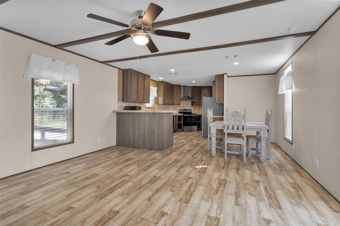 10161 Pollard Road, Unit 1 Willis, TX 77318 - Photo 7 of 22 a view of kitchen with sink and microwave