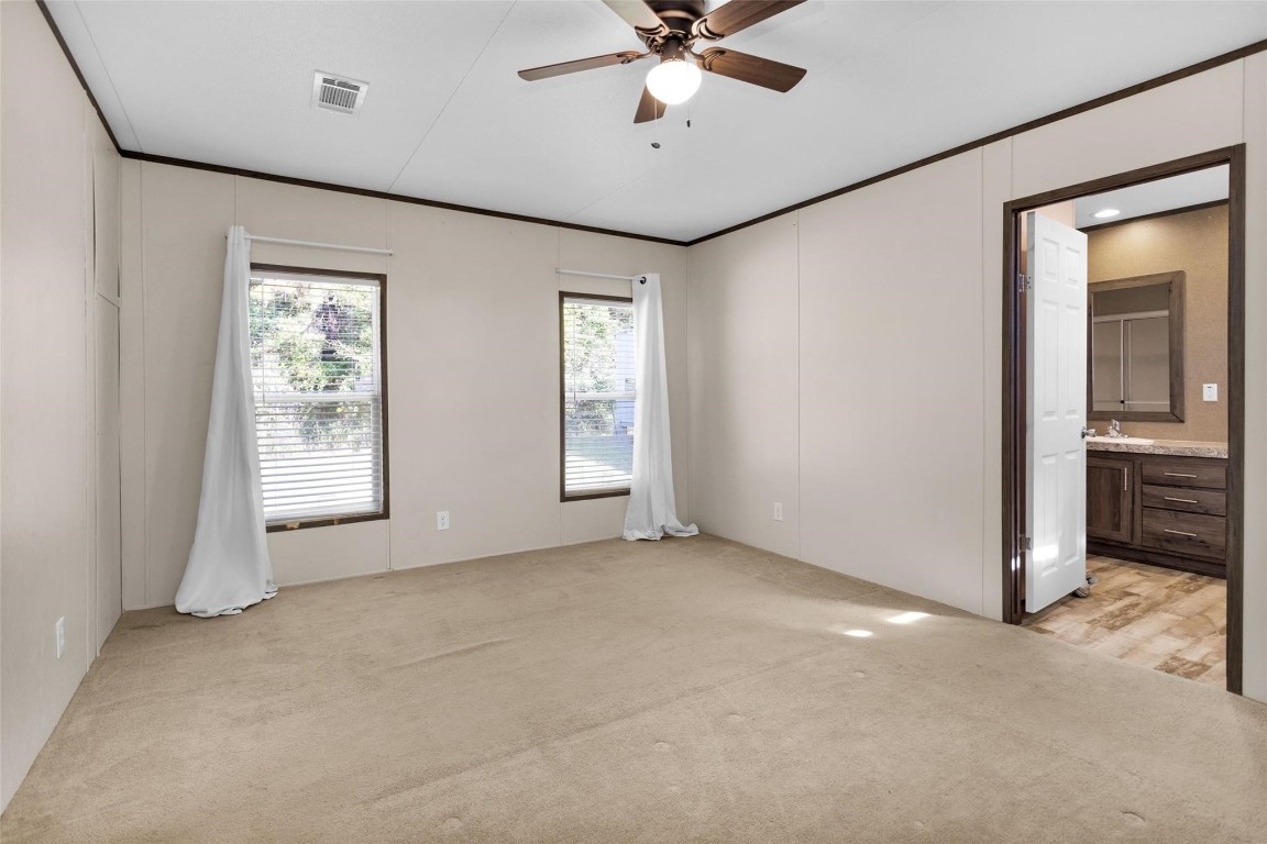 10161 Pollard Road, Unit 1 Willis, TX 77318 - Photo 8 of 22 a view of an empty room with a window