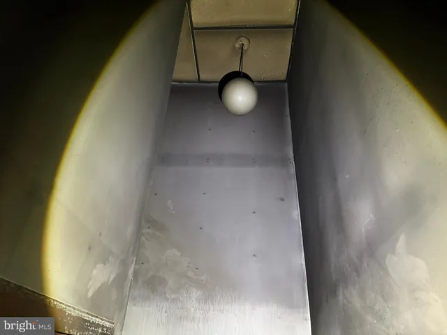 a view of house with backyard