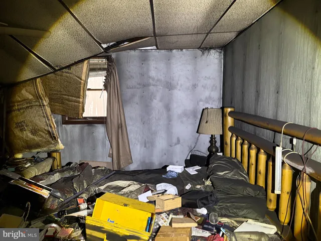 a bathroom with a sink a mirror and a shower