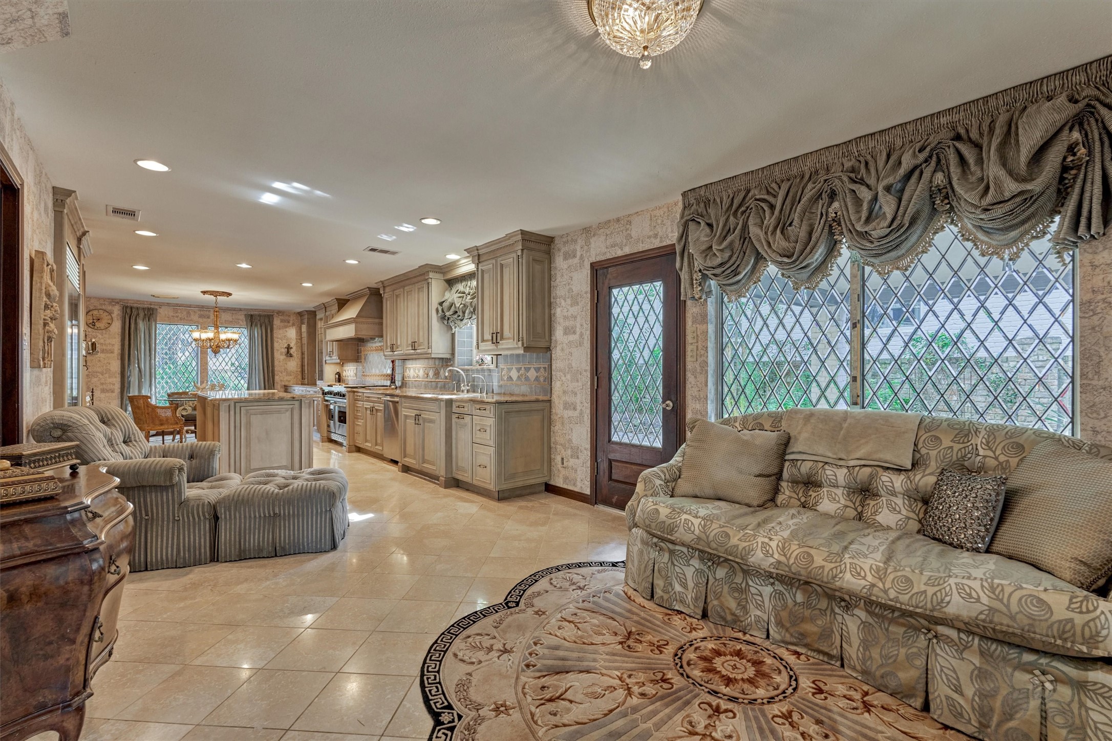 6106 Larkmount Drive Spring, TX 77389 - Photo 16 of 42 a living room with furniture and a chandelier