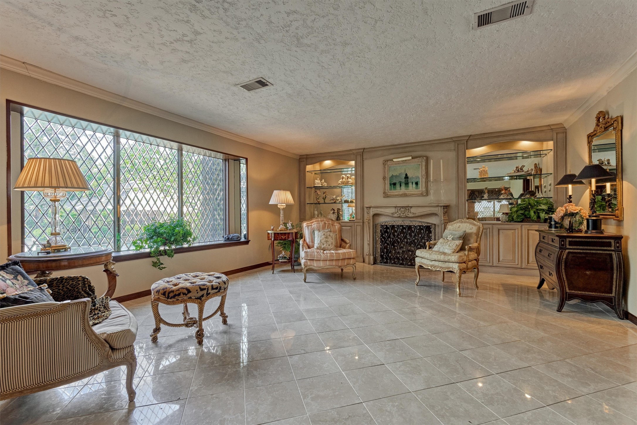 6106 Larkmount Drive Spring, TX 77389 - Photo 20 of 42 a living room with furniture large window and fireplace