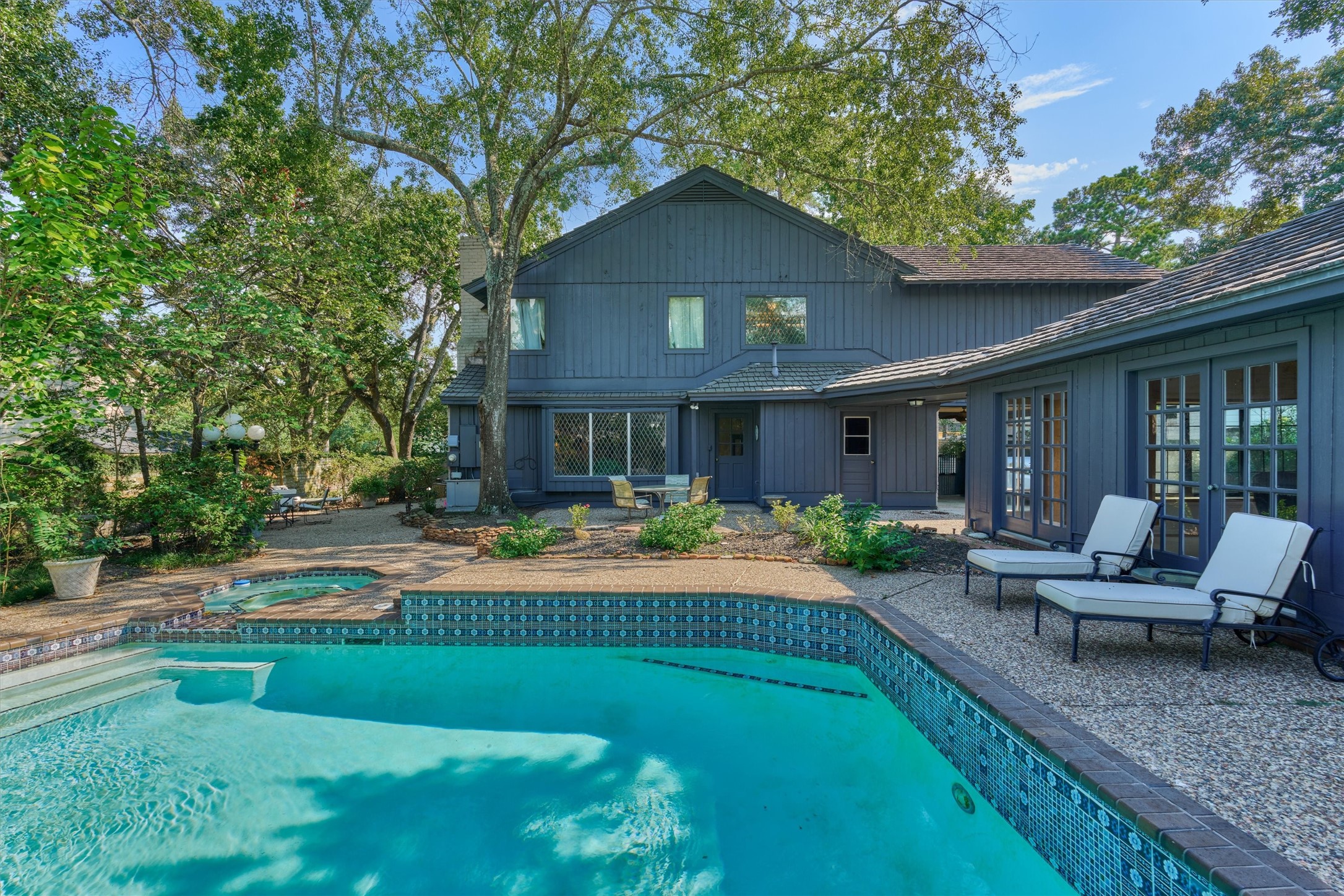 6106 Larkmount Drive Spring, TX 77389 - Photo 38 of 42 a view of a house with backyard and porch with furniture