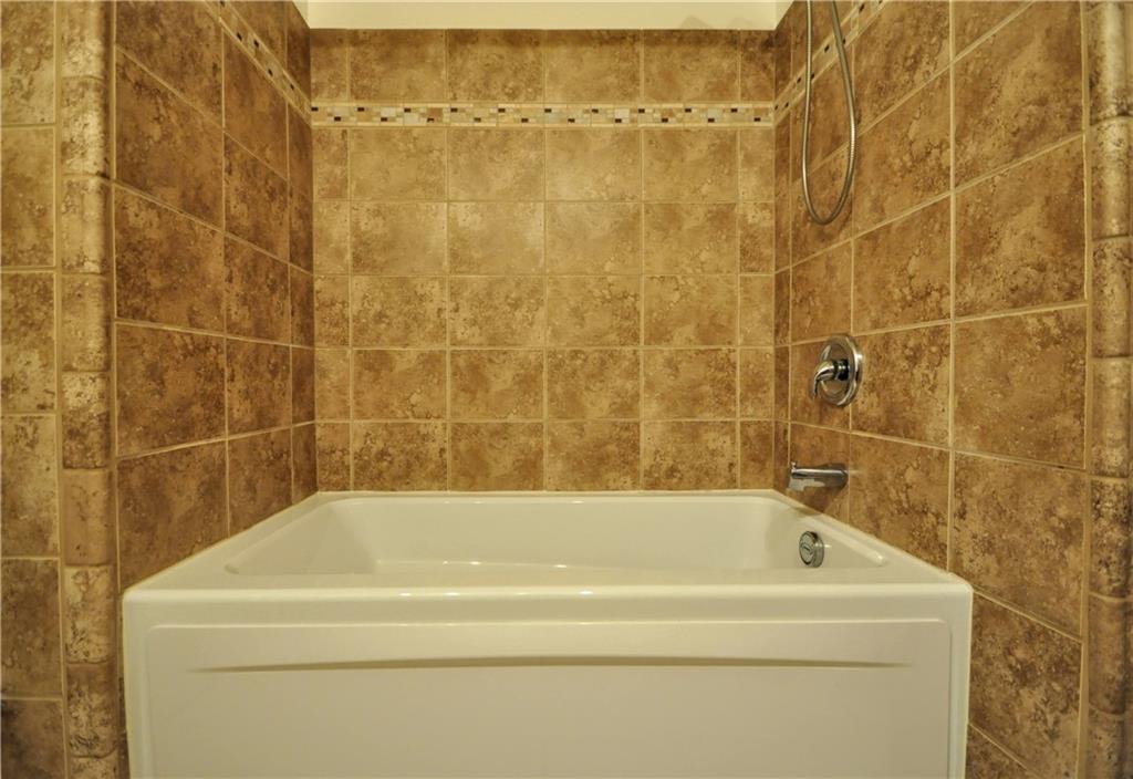 215 Bull Run Road Brownsville, PA 15417 - Photo 14 of 31 a bathroom with a bathtub
