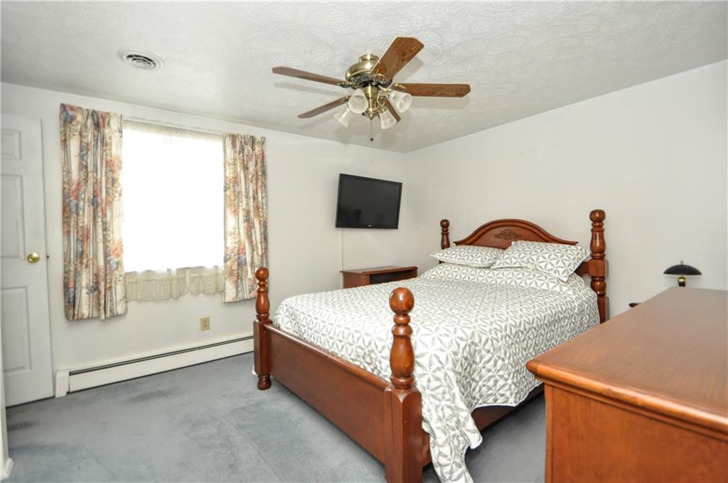 215 Bull Run Road Brownsville, PA 15417 - Photo 17 of 31 a bedroom with bed and window