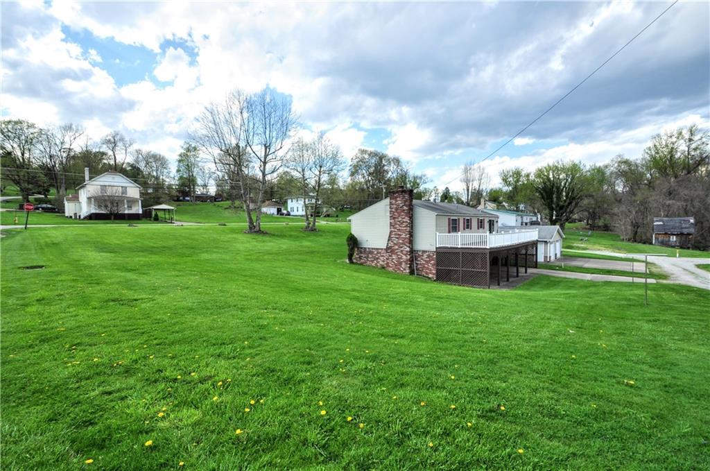 215 Bull Run Road Brownsville, PA 15417 - Photo 27 of 31 a view of a house with backyard