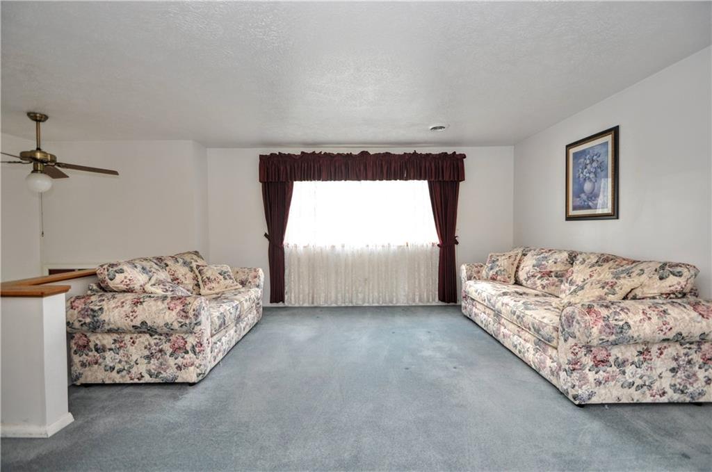 215 Bull Run Road Brownsville, PA 15417 - Photo 6 of 31 a living room with furniture and a couch