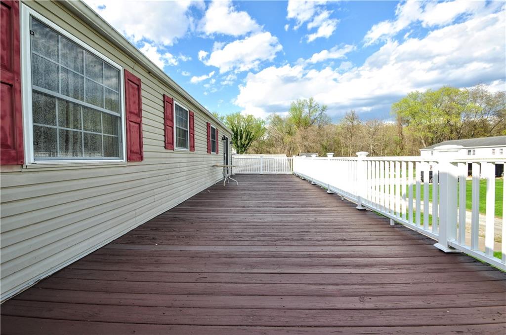 215 Bull Run Road Brownsville, PA 15417 - Photo 9 of 31 a view of a house with wooden deck