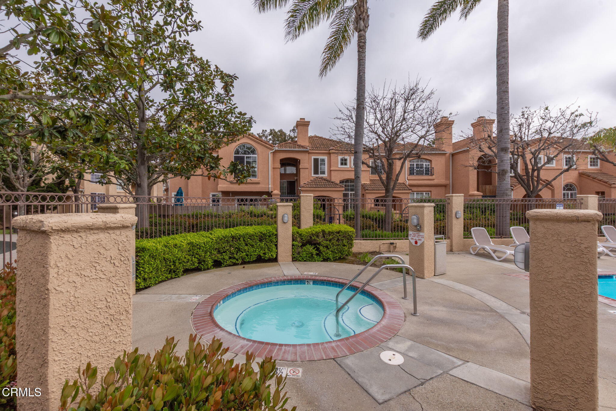 1132 Mooring Walk Oxnard, CA 93030 - Photo 24 of 30 a view of a house with a swimming pool and sitting area