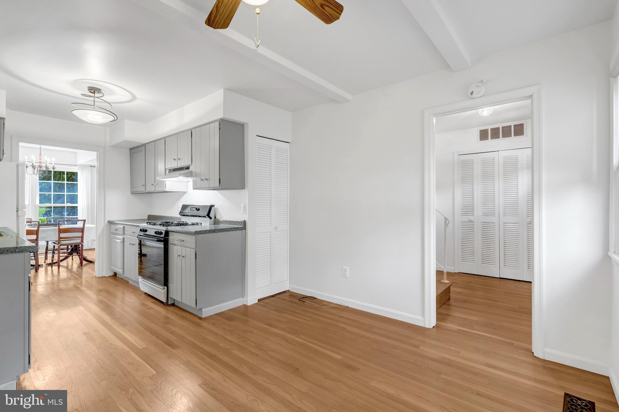 3221 Adams Court Fairfax, VA 22030 - Photo 13 of 51 a kitchen with wooden floors and appliances