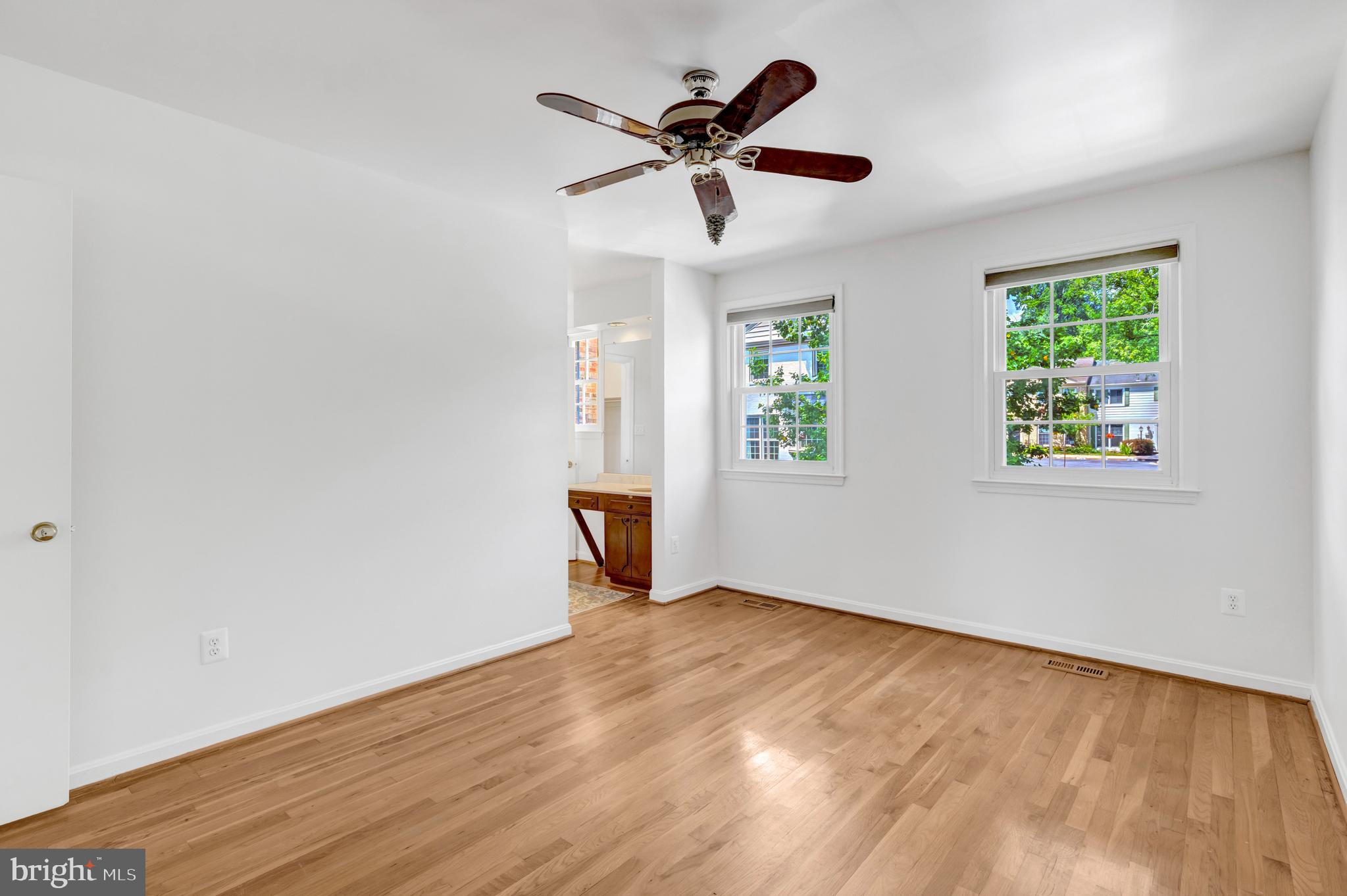3221 Adams Court Fairfax, VA 22030 - Photo 16 of 51 wooden floor in an empty room with a window
