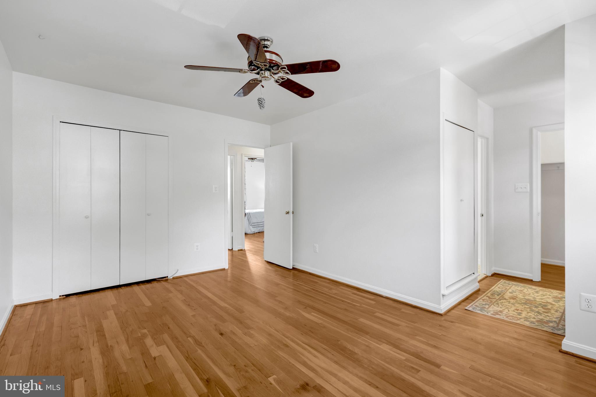 3221 Adams Court Fairfax, VA 22030 - Photo 17 of 51 a view of empty room with wooden floor