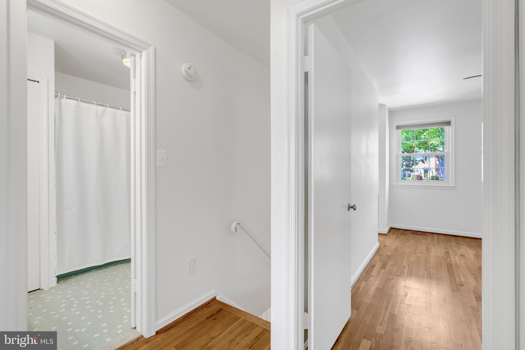 3221 Adams Court Fairfax, VA 22030 - Photo 27 of 51 a view of front door with wooden floor