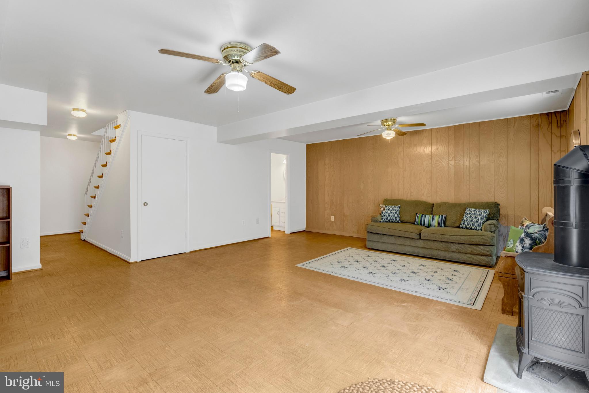 3221 Adams Court Fairfax, VA 22030 - Photo 33 of 51 a living room with furniture and a chandelier