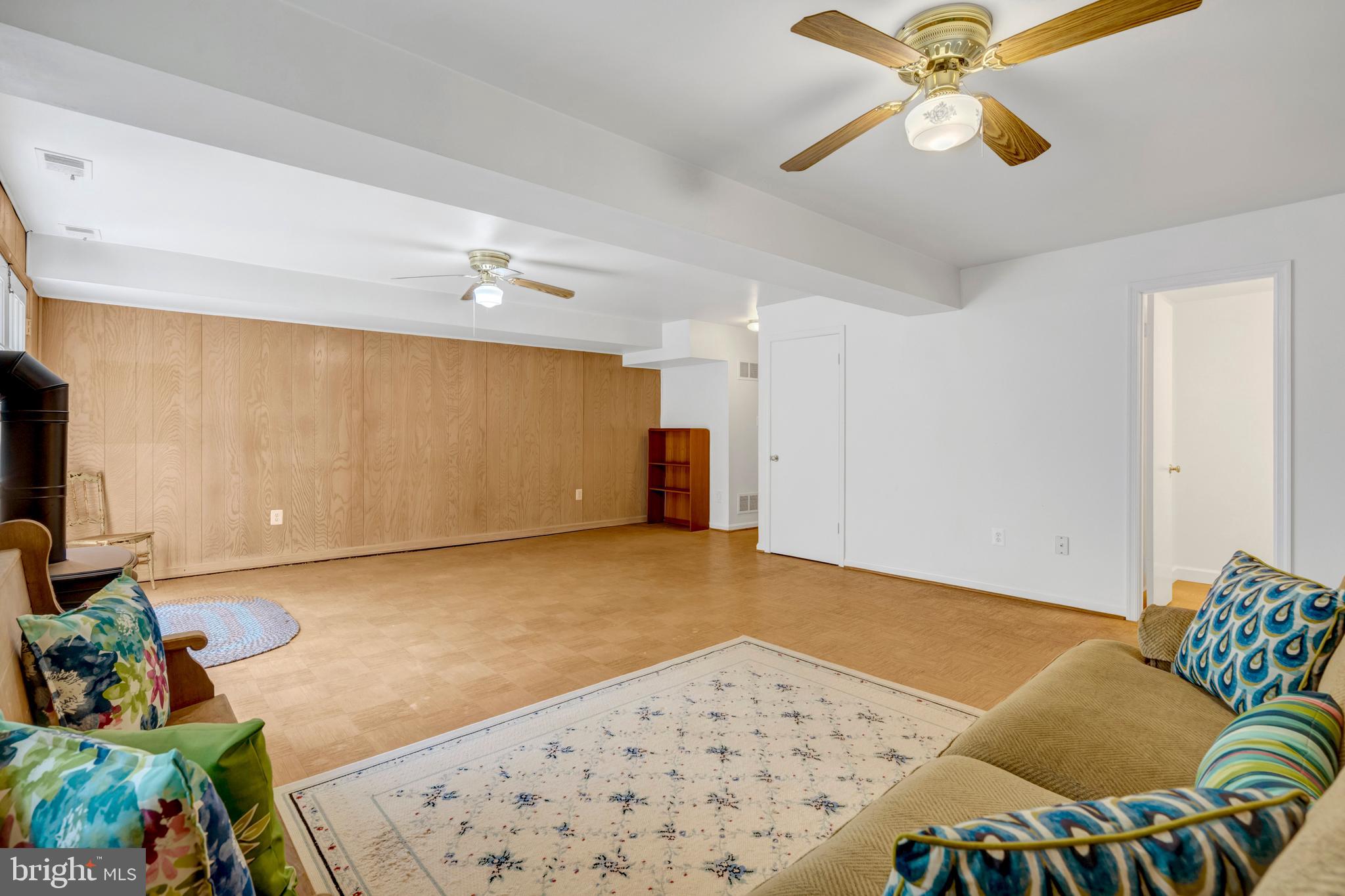 3221 Adams Court Fairfax, VA 22030 - Photo 34 of 51 a bedroom with a bed and a chandelier