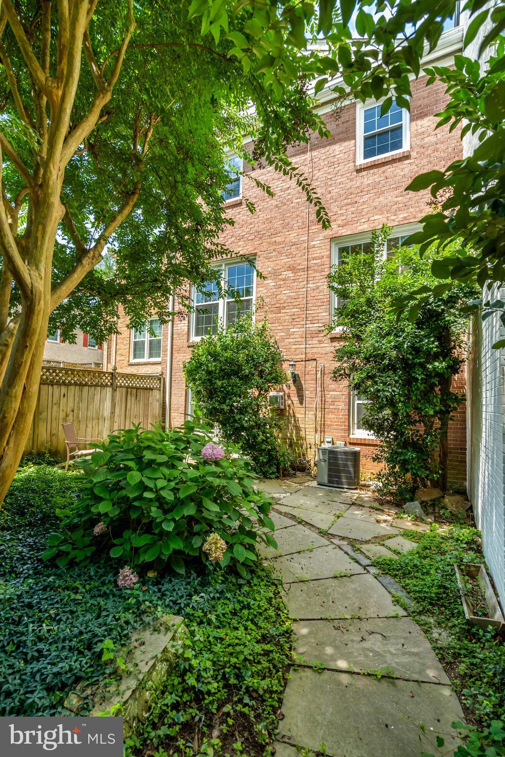 3221 Adams Court Fairfax, VA 22030 - Photo 39 of 51 front view of a house with a yard