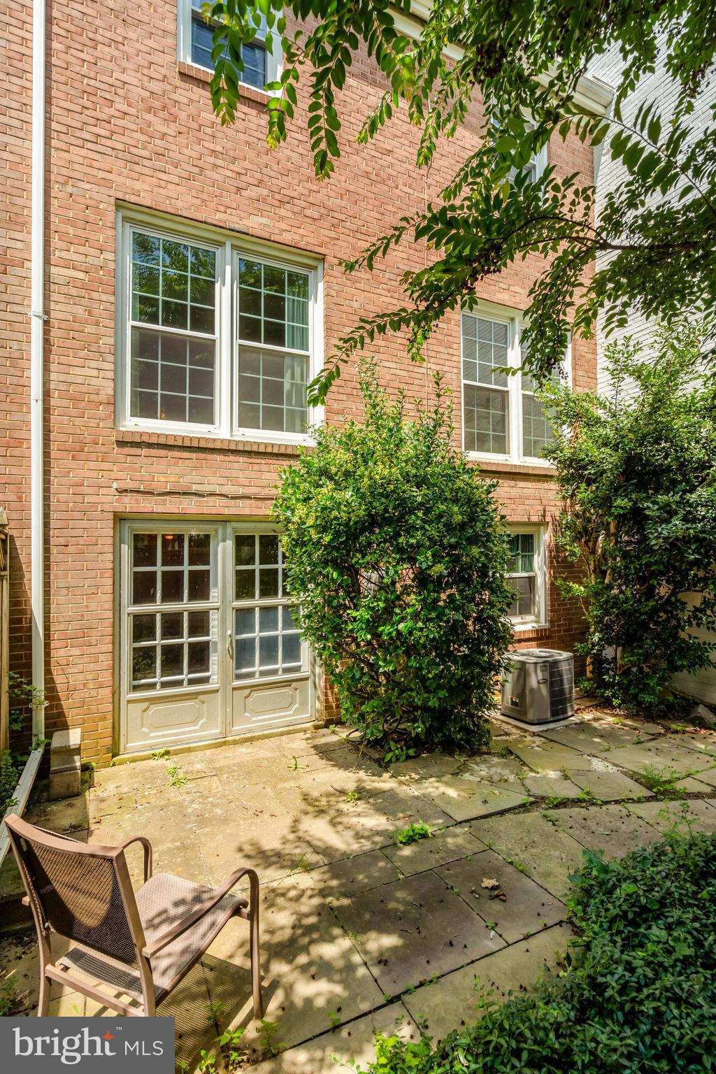 3221 Adams Court Fairfax, VA 22030 - Photo 40 of 51 a front view of a house with a yard