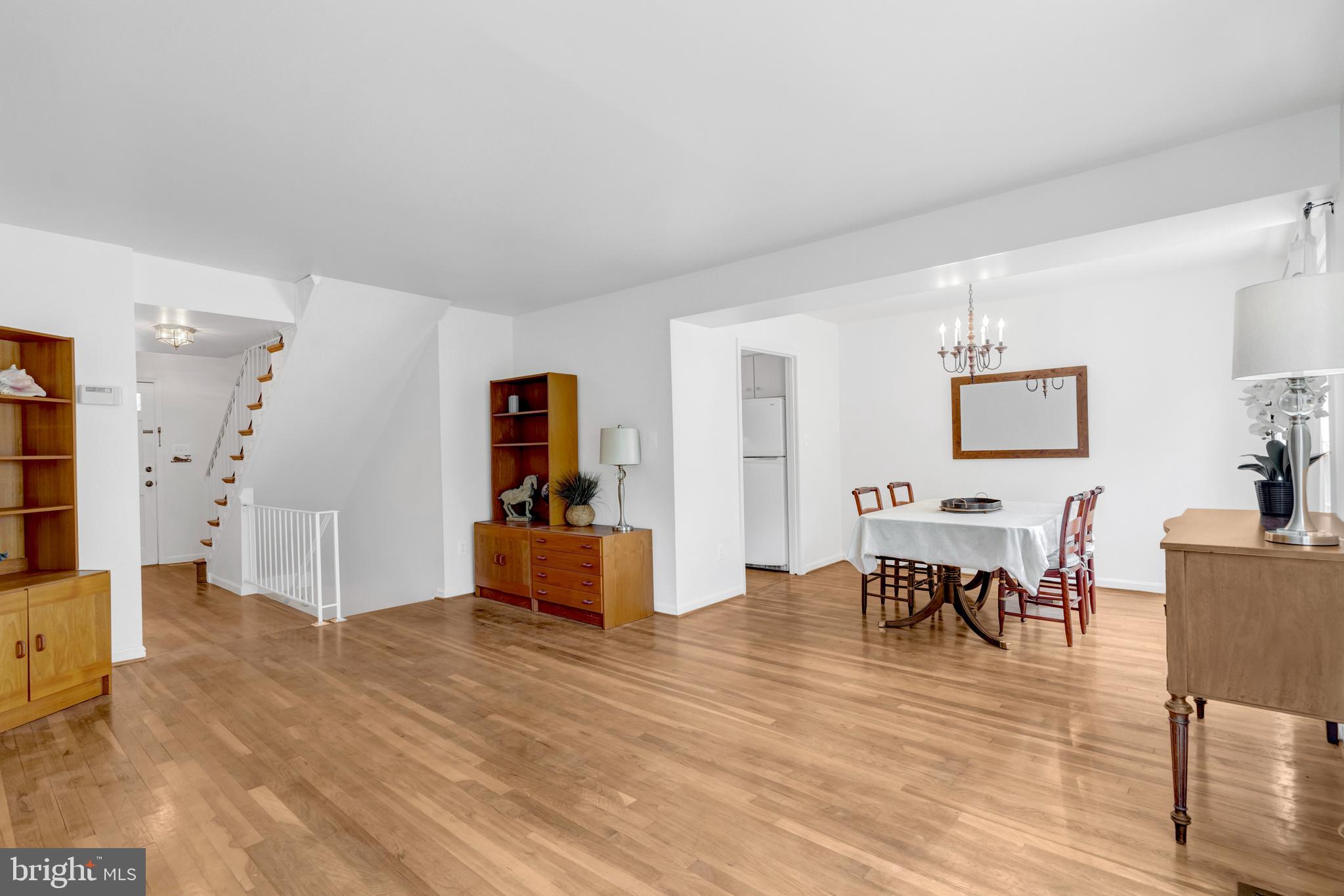 3221 Adams Court Fairfax, VA 22030 - Photo 4 of 51 a living room with furniture and wooden floor