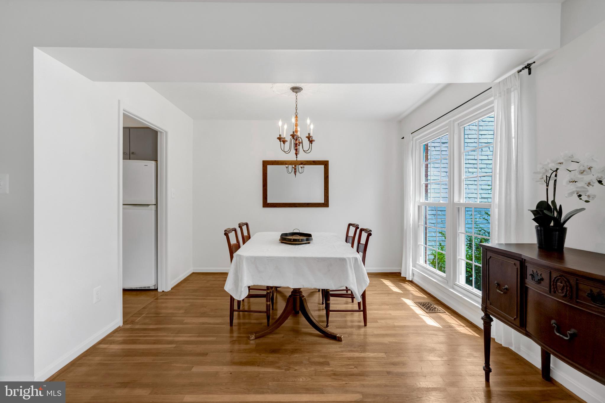 3221 Adams Court Fairfax, VA 22030 - Photo 5 of 51 a dining room with furniture window wooden floor