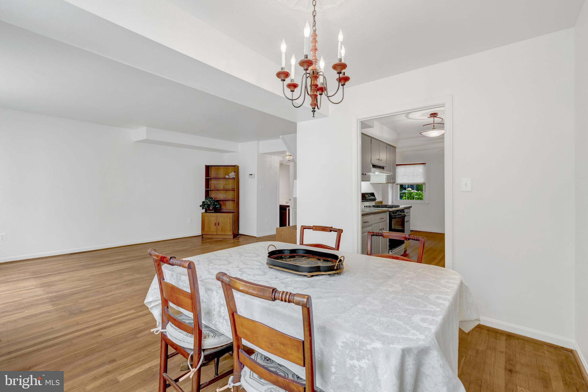 3221 Adams Court Fairfax, VA 22030 - Photo 8 of 51 a living room with furniture and a table