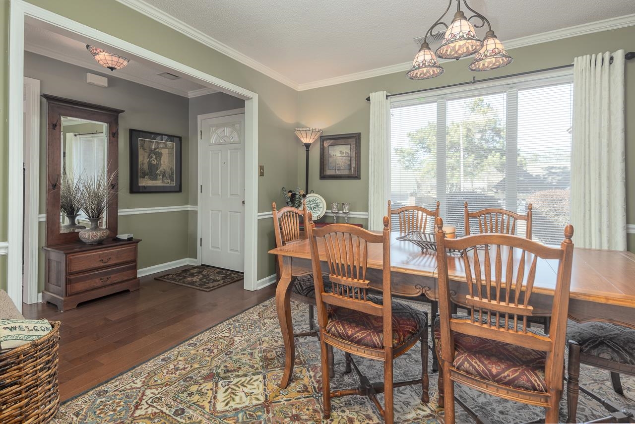4600 Shadow Field Lane Bartlett, TN 38002 - Photo 12 of 33 a view of a dining room with furniture window and wooden floor