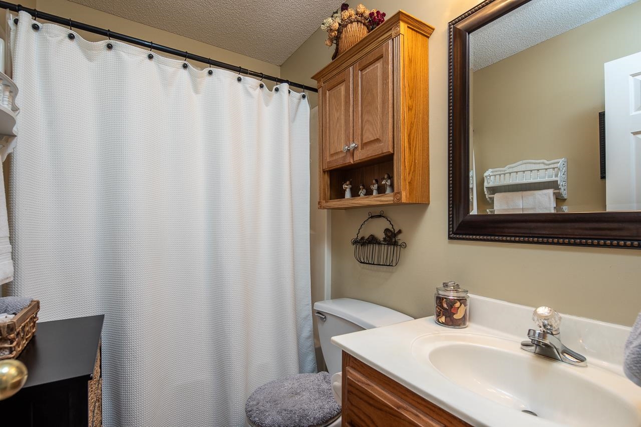 4600 Shadow Field Lane Bartlett, TN 38002 - Photo 24 of 33 a bathroom with a sink and a mirror