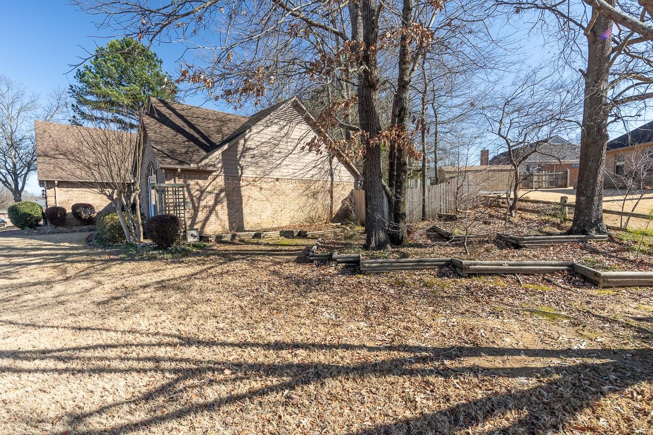 4600 Shadow Field Lane Bartlett, TN 38002 - Photo 3 of 33 a view of a house with a snow in the yard