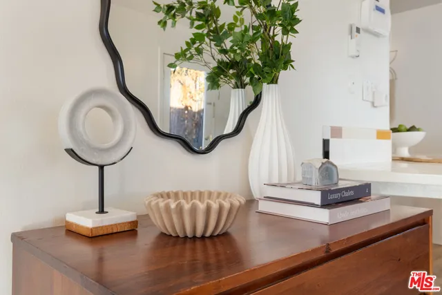 a vase of flowers sitting on a table