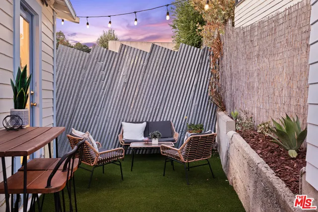 a view of a chairs in patio