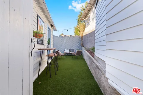 a view of a yard in front of a house