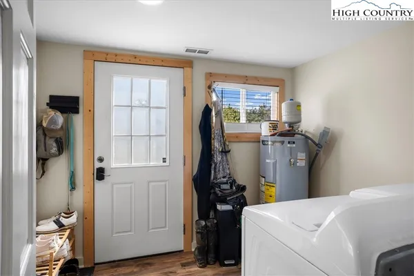 a view of room with washer and dryer