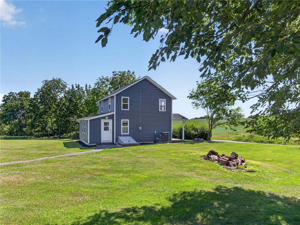 291 East Dannersville Road Bath, PA 18014 - Photo 8 of 46 A tranquil countryside setting with a welcoming side entrance and verdant lawn.