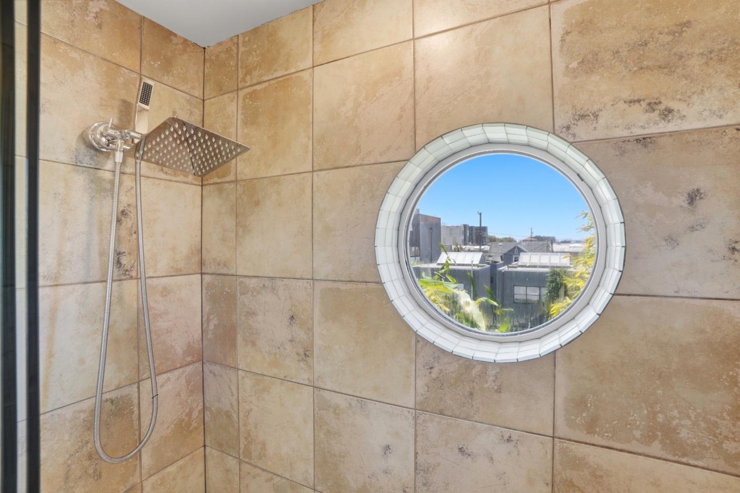 2709 Tenth Street, Unit C Berkeley, CA 94710 - Photo 42 of 44 view of a bathroom with a sink and a mirror