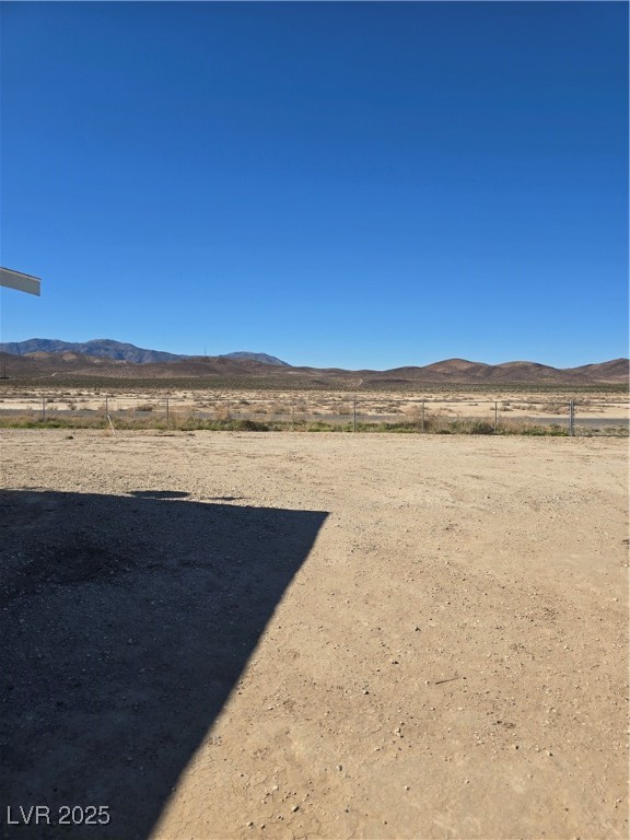 4980 Retread Road Pahrump, NV 89048 - Photo 3 of 35 View of mountain backdrop featuring rural landscape