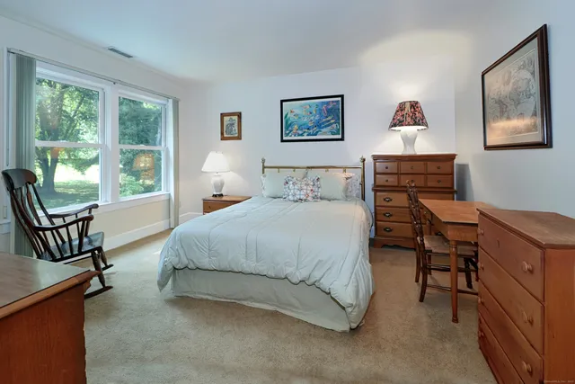 a view of a bathroom from a hallway