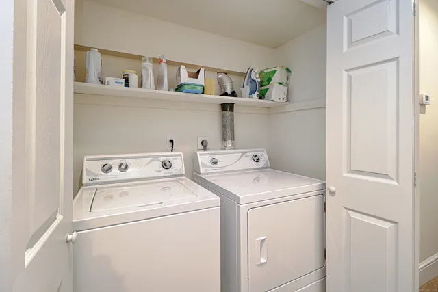 a workspace with furniture and window