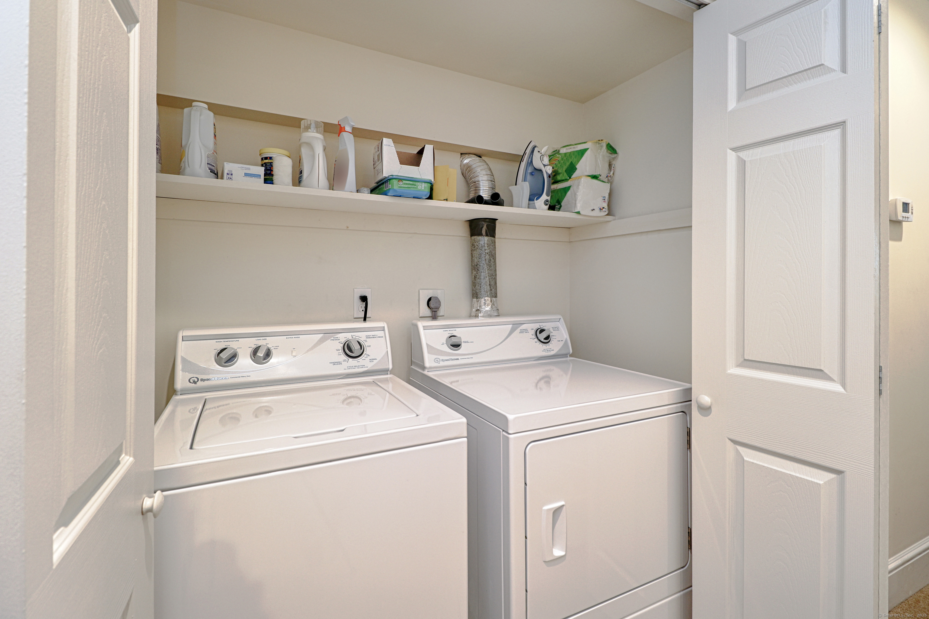 972 South Pine Creek Road, Unit 972 Fairfield, CT 06824 - Photo 26 of 37 a utility room with dryer and washer