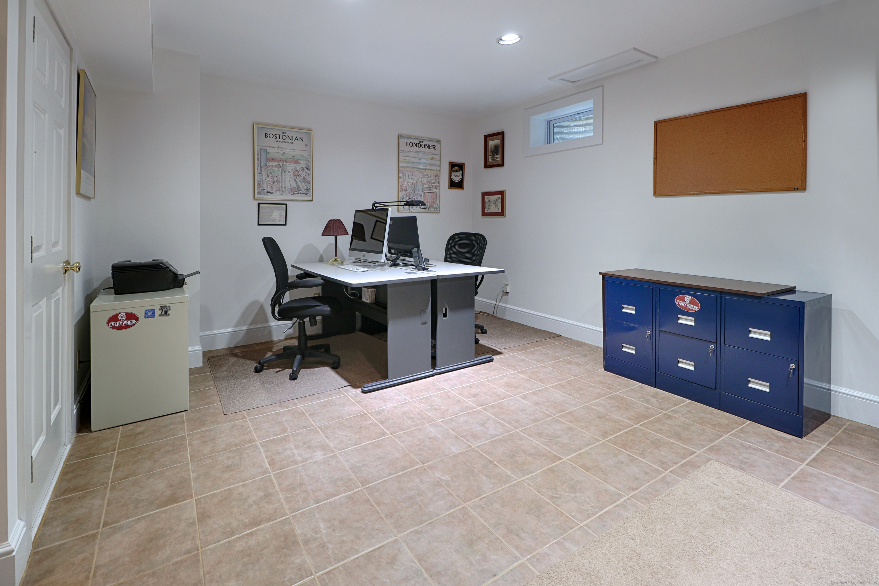 972 South Pine Creek Road, Unit 972 Fairfield, CT 06824 - Photo 27 of 37 a workspace with furniture and window