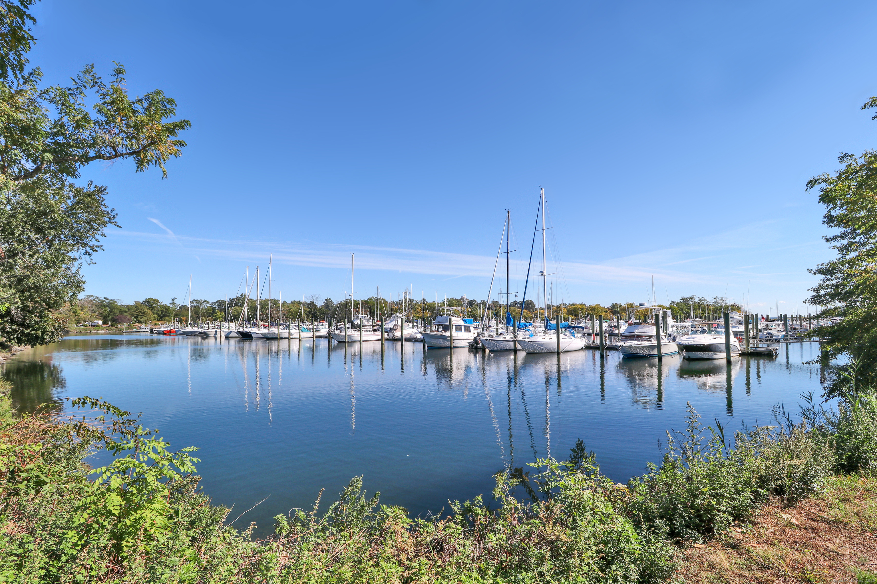 972 South Pine Creek Road, Unit 972 Fairfield, CT 06824 - Photo 36 of 37 a view of a lake with a city view