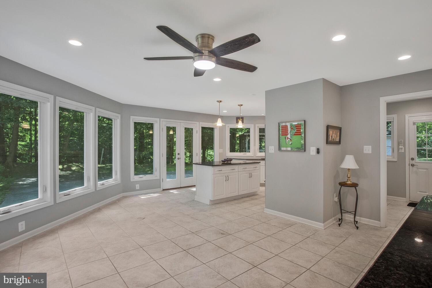 3 Armory Road Prince Frederick, MD 20678 - Photo 14 of 63 Breakfast area and sitting area w/ walls of glass