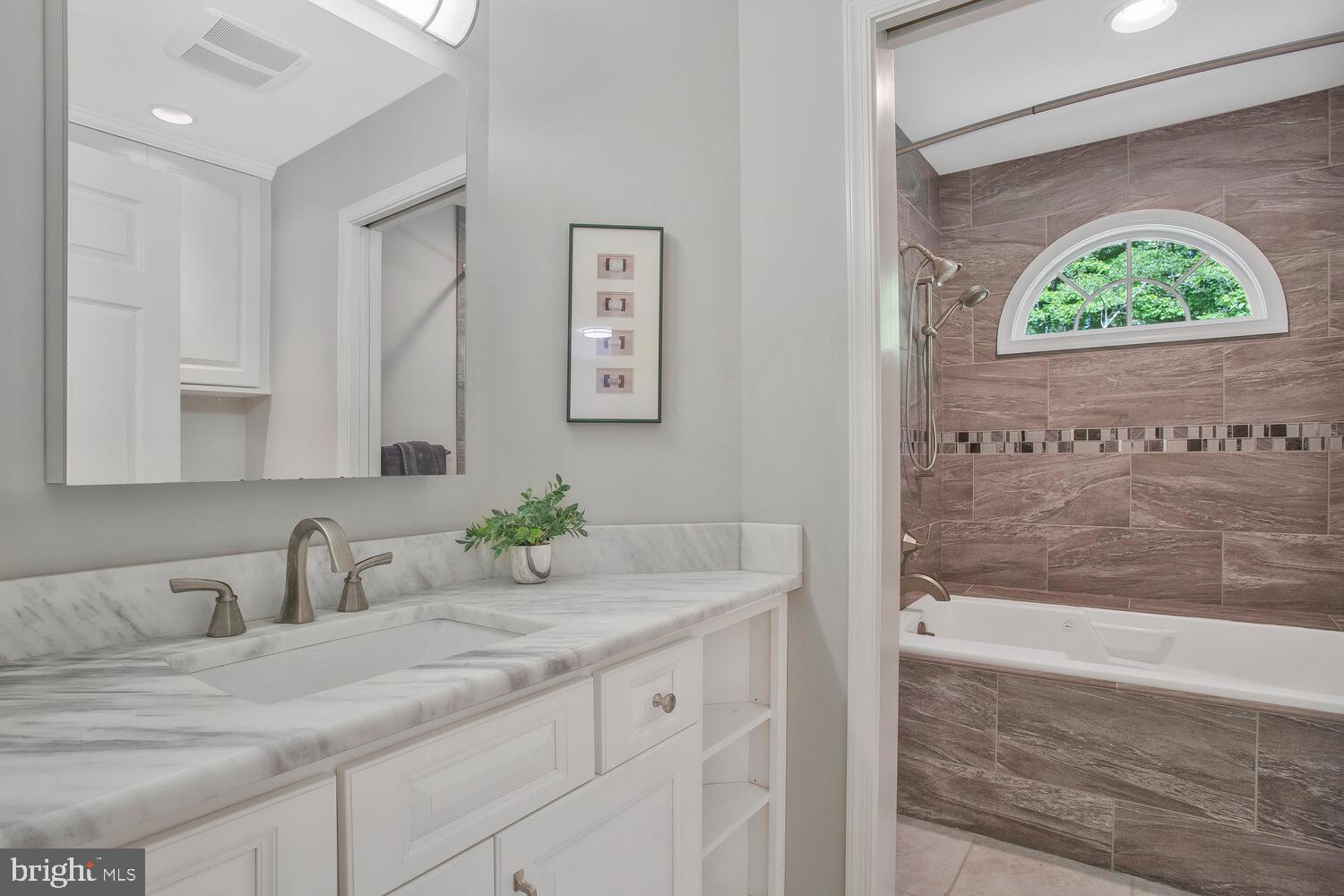 3 Armory Road Prince Frederick, MD 20678 - Photo 33 of 63 Hall bath with granite countertop.