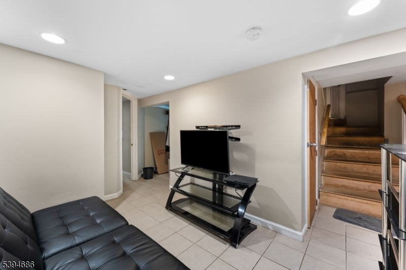 907 Flora Street Elizabeth, NJ 07201 - Photo 22 of 24 a view of workspace with chair